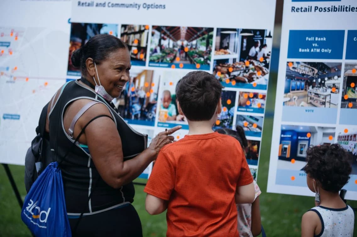 woman and children at community event